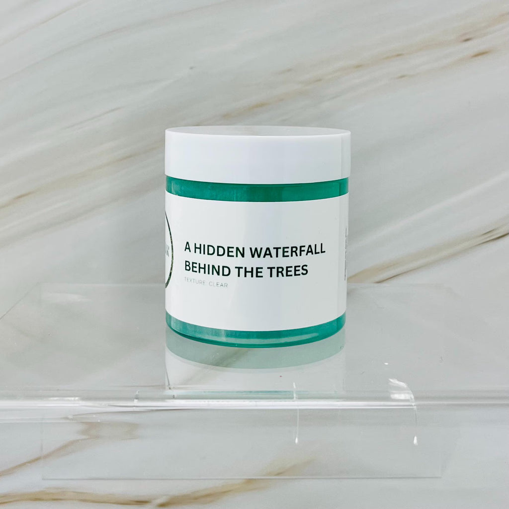 A Hidden Waterfall Behind The Trees